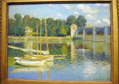 Estado en el que ha quedado el cuadro de Monet 'Le pont d'Argentueil' ('El puente de Argentueil') después de que un grupo de cinco personas entraran en el Museo de Orsay y propinaran un puñetazo al lienzo.