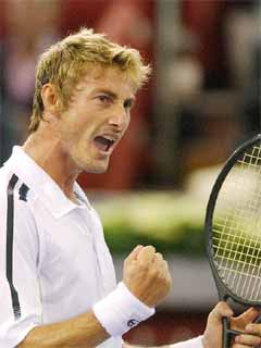 Ferrero celebra su victoria frente al suizo Federer.
