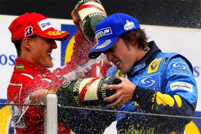 El piloto español y el alemán se bañan en champán en el podio de Ímola.