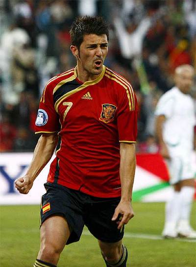 David Villa celebra el gol ante Irak.