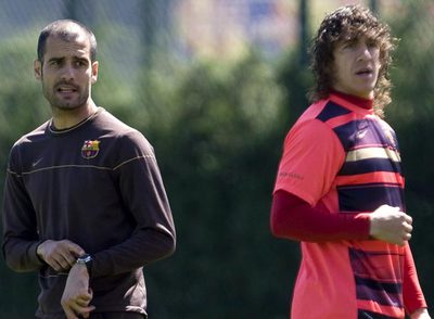 Puyol y Guardiola.