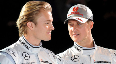 Nico Rosberg y Michael Schumacher, durante la presentación.