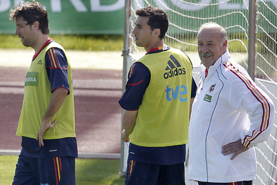 Capdevila, Arbeloa y Del Bosque durante el entrenamiento de hoy