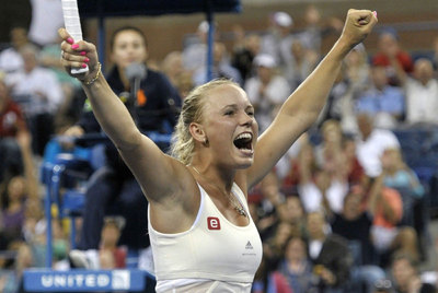 Wozniacki celebra su victoria.
