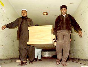 El traslado del cadáver del periodista.