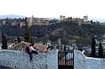 Atardecer frente a la Alhambra de Granada desde el mirador de San Nicolás.