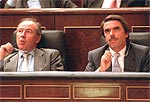 Rodrigo Rato, vicepresidente y ministro de Economía, con José María Aznar.
