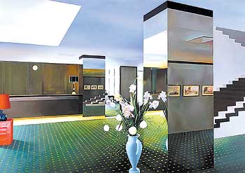 'Lobby' (1985-1987), óleo sobre lienzo de Richard Hamilton.