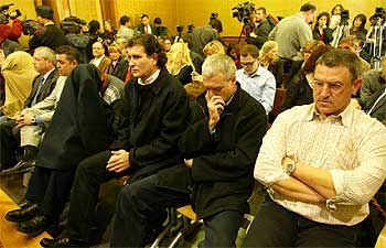 De derecha a izquierda, Sebastià Comas, José Luis Paz, Juan Manuel Pérez y Antoni Guirado, con la cara tapada.