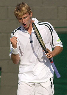 Juan Carlos Ferrero festeja su punto ganador.