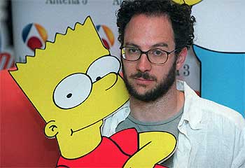 El productor ejecutivo de  Los Simpson  Matt Selman, junto a Bart Simpson, en Madrid.