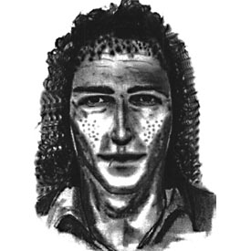 Hombre de unos 30 años de edad, 1'801'85 m. de estatura, complexión delgada, tez blanca, pelo largo a la altura de los hombros, de color castaño, sin barba ni bigote, sin gafas, con señales de acné en la cara, cicatriz en el labio inferior como de un corte antiguo. Portaba en el cuello una cadena gruesa de oro con una cruz con los símbolos de Ying-Yang en el centro. Habla español.