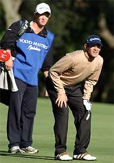 Carlos Rodiles  y su  caddie  . 
