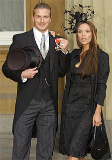 El matrimonio Beckham, ayer en Buckingham Palace.