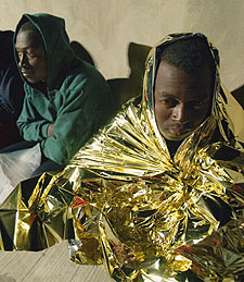 Inmigrantes detenidos en la costa de Fuerteventura, a su llegada al puerto de Gran Tarajal.