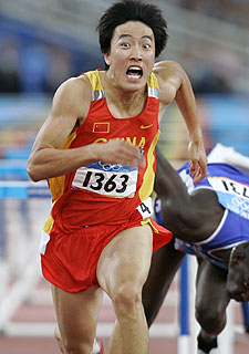 Xiang Liu, poco antes de entrar a la meta.