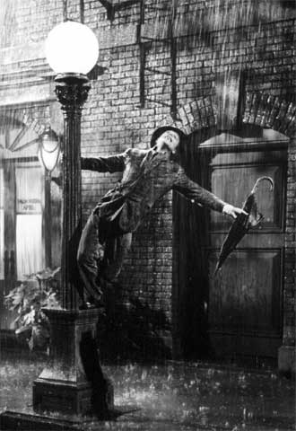 Gene Kelly en  Cantando bajo la lluvia. 