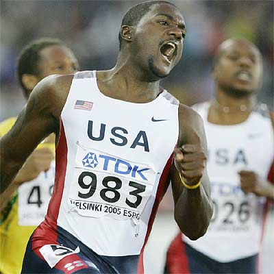 Justin Gatlin celebra su victoria en la final de los 100 metros.