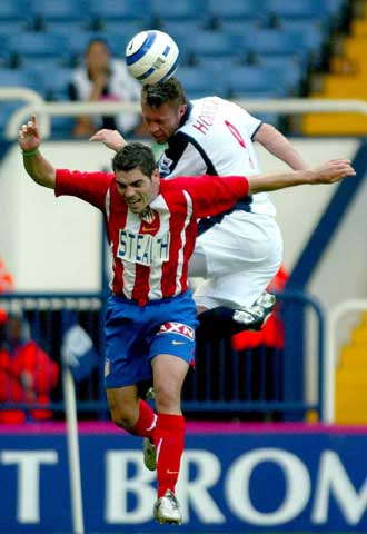  Fecha y lugar de nacimiento : 13-09-1981, Benidormrn Demarcación : Lateral Izquierdorn Equipo : Atletico de Madrid