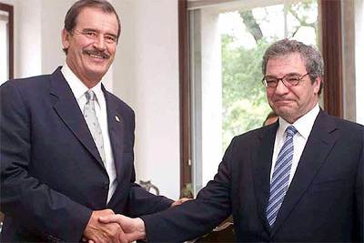 El presidente de México, Vicente Fox, con el presidente de Telefónica, César Alierta.