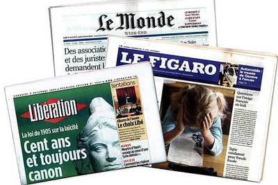 Portadas de los diarios franceses  Le Monde,   Le Figaro  y  Libération. 