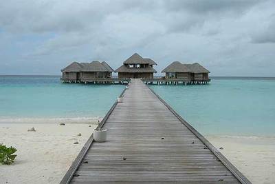 Algunos de los 43 bungalós del  resort  Huvafen Fushi, en Maldivas.