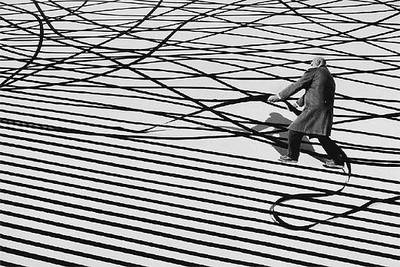  Cambiar el mundo ,  fotografía de  Gilbert Garcin realizada en 2001.