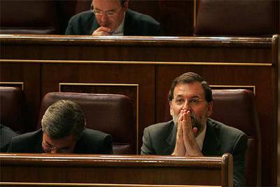 El presidente del PP, Mariano Rajoy, durante el pleno de ayer en el Congreso.