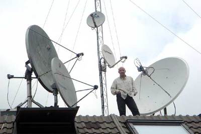 Julio Maldonado,  Maldini , en el tejado de su casa.