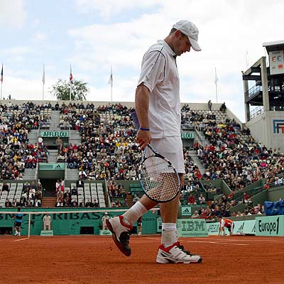 Andy Roddick, poco antes de retirarse ante Alberto Martín.