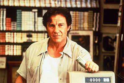 Harvey Keitel, en el papel del tendero Auggie, personaje del filme  Smoke .