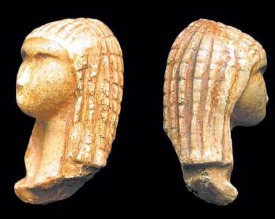 Reproducción de la pieza paleolítica conocida como la  Venus de la capucha,  hallada en Francia.