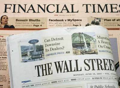 Primeras páginas de ayer de  The Wall Street Journal  y  Financial Times. 