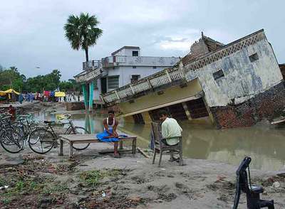 Casas arrasadas por las inundaciones monzónicas en la localidad de Bashi.
