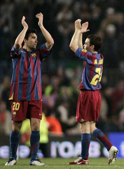 Deco e Iniesta, en un partido de Liga.