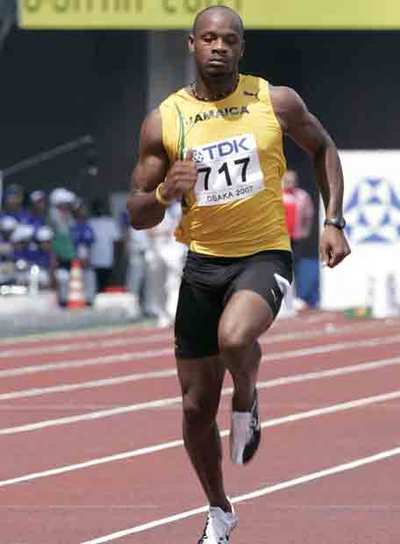 Powell, a la izquierda durante su carreras de ayer.