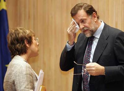 El presidente del PP, Mariano Rajoy, al inicio de la reunión con su grupo en el Congreso.