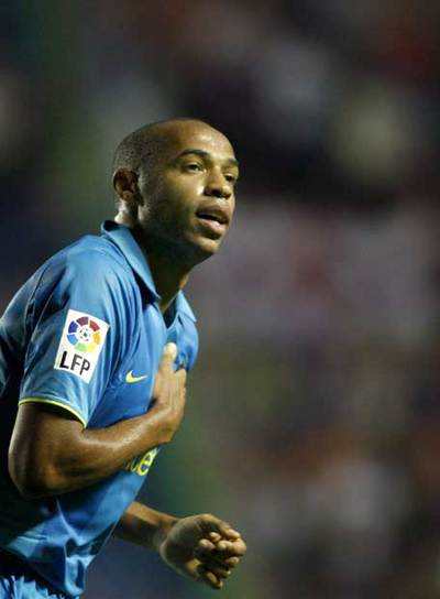 Henry celebra su primer gol.