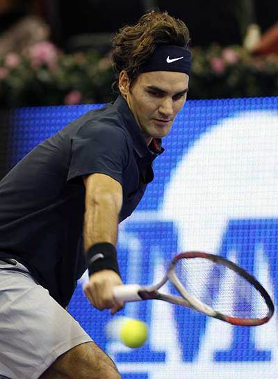 Roger Federer logra un tanto en su duelo con Robby Ginepri