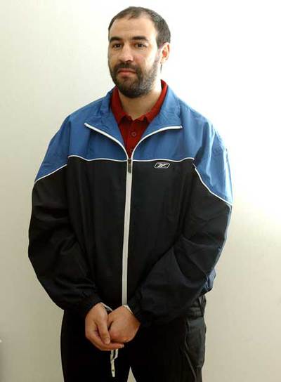 Mohamed Achraf, cuando fue extraditado a España en 2005.