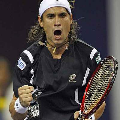 Ferrer celebra un punto contra Djokovic.