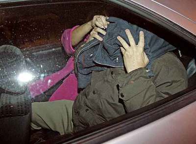 Imputados por el 'caso Guateque' abandonan los juzgados de la plaza de Castilla.