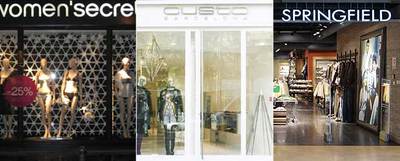Fachadas de tiendas de Women'secret, Custo y Springfield en la capital francesa.