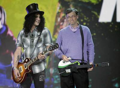 Slash, ex guitarrista de Guns N'Roses, y Bill Gates.