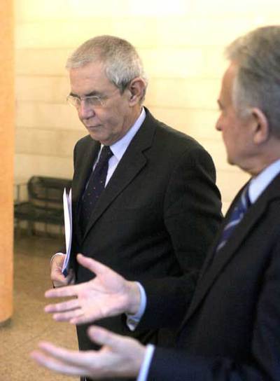 Touriño, con el conselleiro Méndez Romeu, a la entrada del Consello.