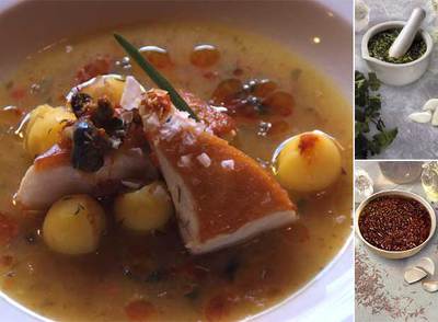 Lomo de peto en caldo marinero, con mojo de azafranillo canario, burgados y papas negras.