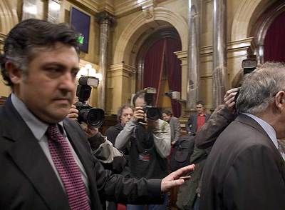 Joan Puigcercós y Josep Lluís Carod Rovira, en el Parlamento catalán el pasado miércoles.   