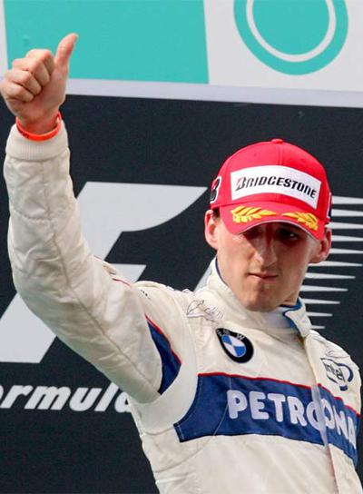 Kubica celebra su segundo puesto en el podio.