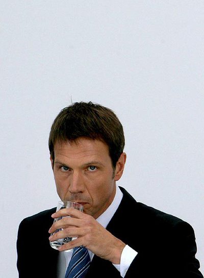 A la izquierda, el presidente de Deutsche Telekom, René Obermann.