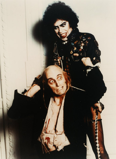 Tim Curry (arriba) y Richard O'Brien, en  The Rocky Horror Picture Show. 